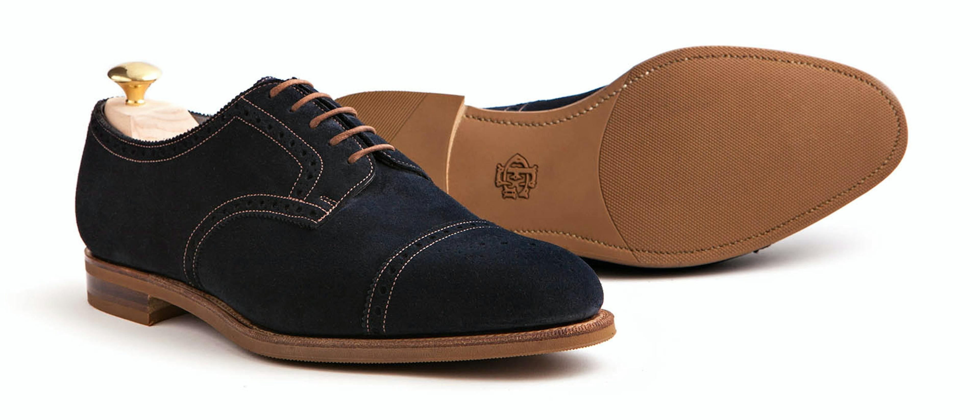 An Edward Green Cardiff in navy suede, with a view of its R1 rubber soles.