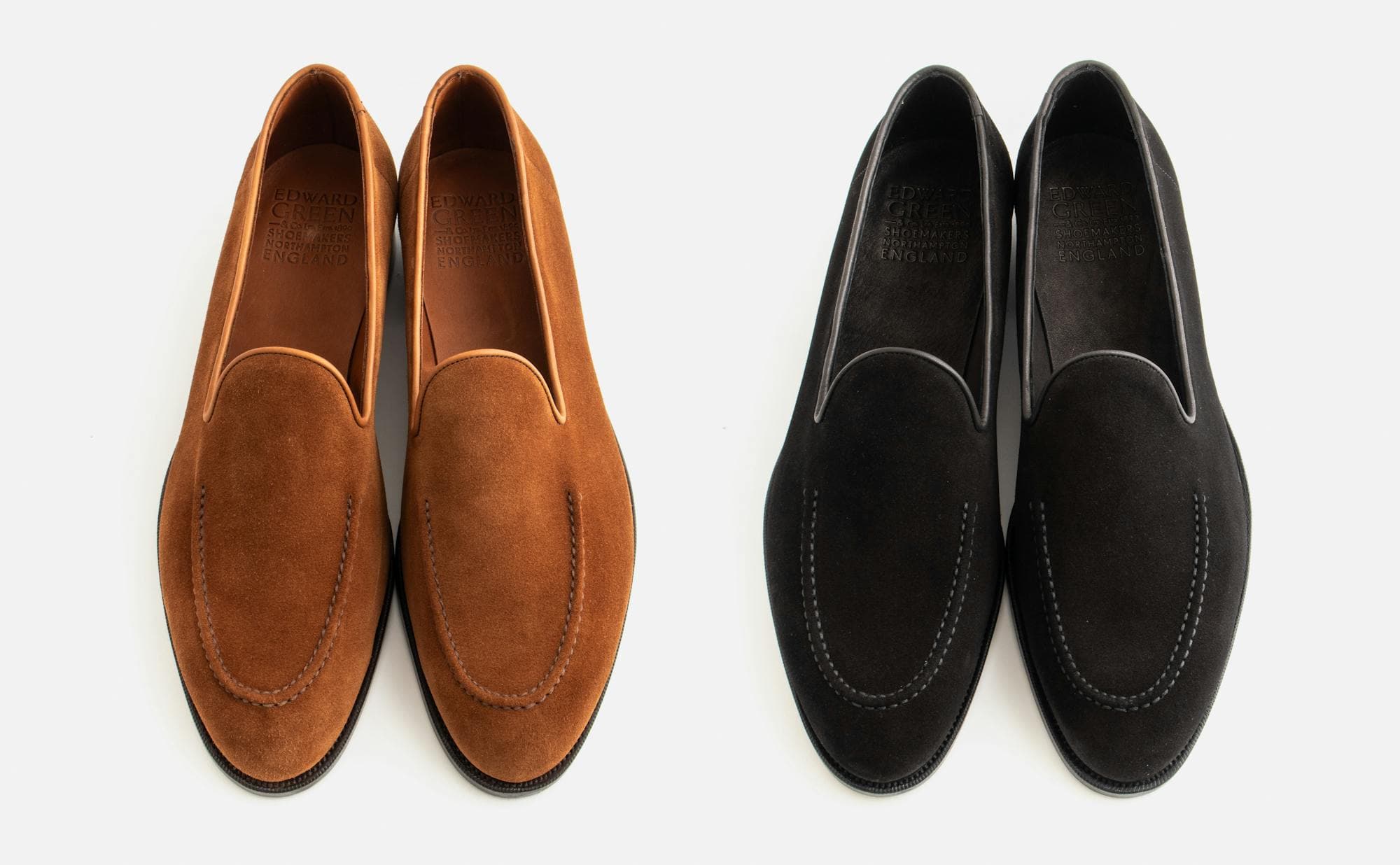 Two pairs of Edward Green Hampton loafers — one in snuff suede and the other in black suede.