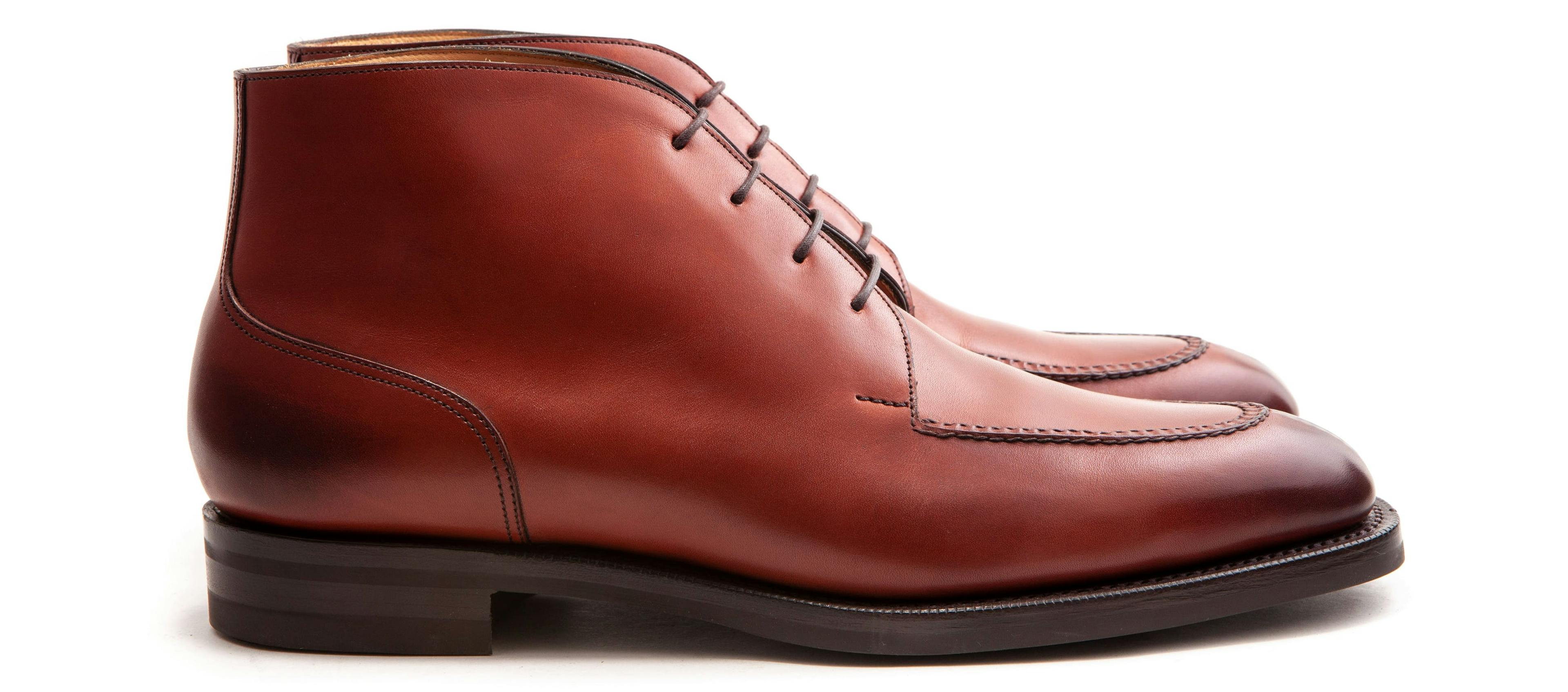 Side view of an Edward Green Halifax in bauxite calfskin.